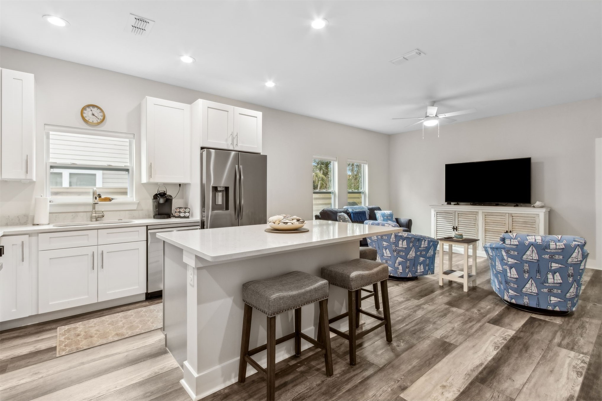 2017 Ryan Road Fernandina Beach, FL 32034 - Photo 9 of 39 a living room with furniture a flat screen tv and kitchen view