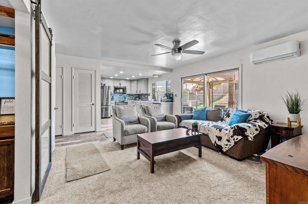 772 Barsby Street Vista, CA 92084 - Photo 12 of 28 a living room with furniture and a large window