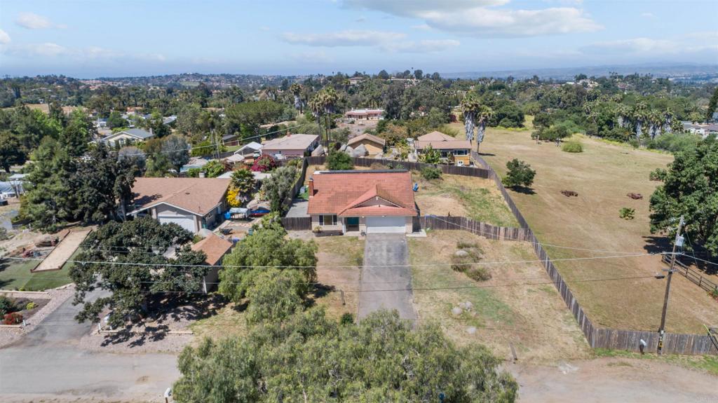 772 Barsby Street Vista, CA 92084 - Photo 2 of 28 an aerial view of a city with lots of residential buildings