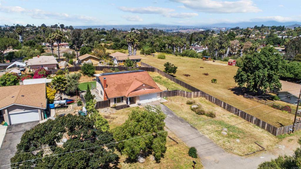 772 Barsby Street Vista, CA 92084 - Photo 25 of 28 an aerial view of a city with lots of residential buildings ocean and mountain view in back