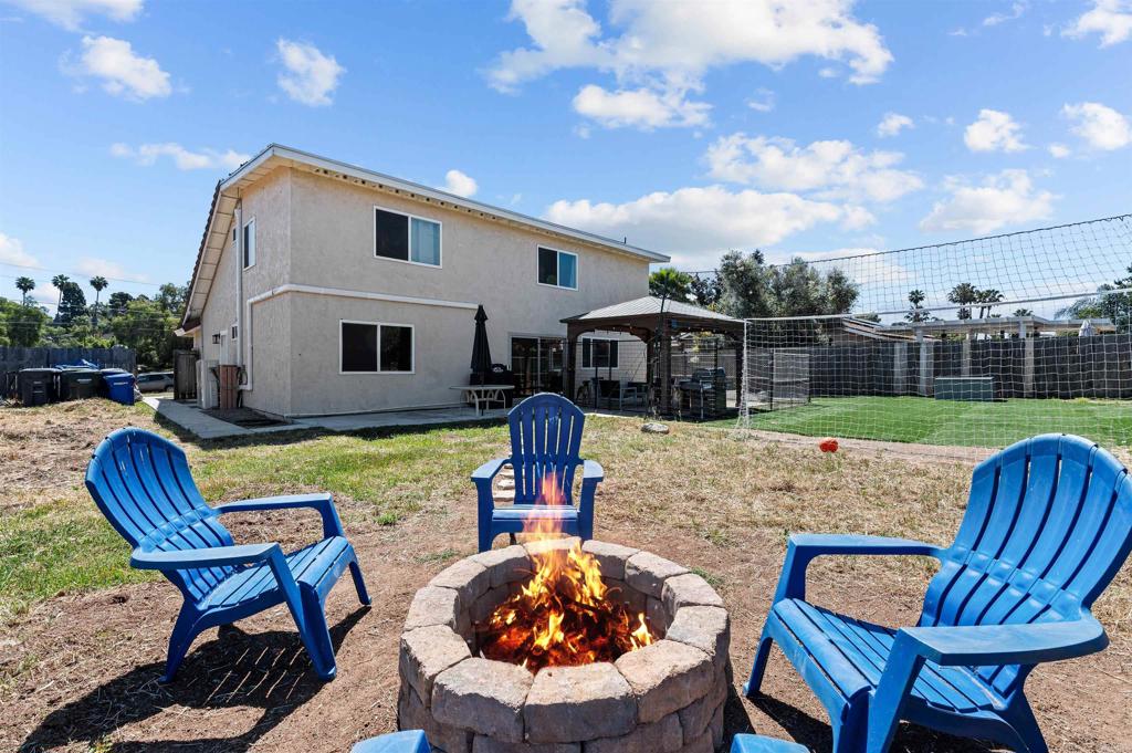 772 Barsby Street Vista, CA 92084 - Photo 4 of 28 a view of yard with furniture and tub
