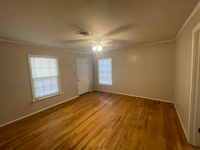 a view of an empty room and window