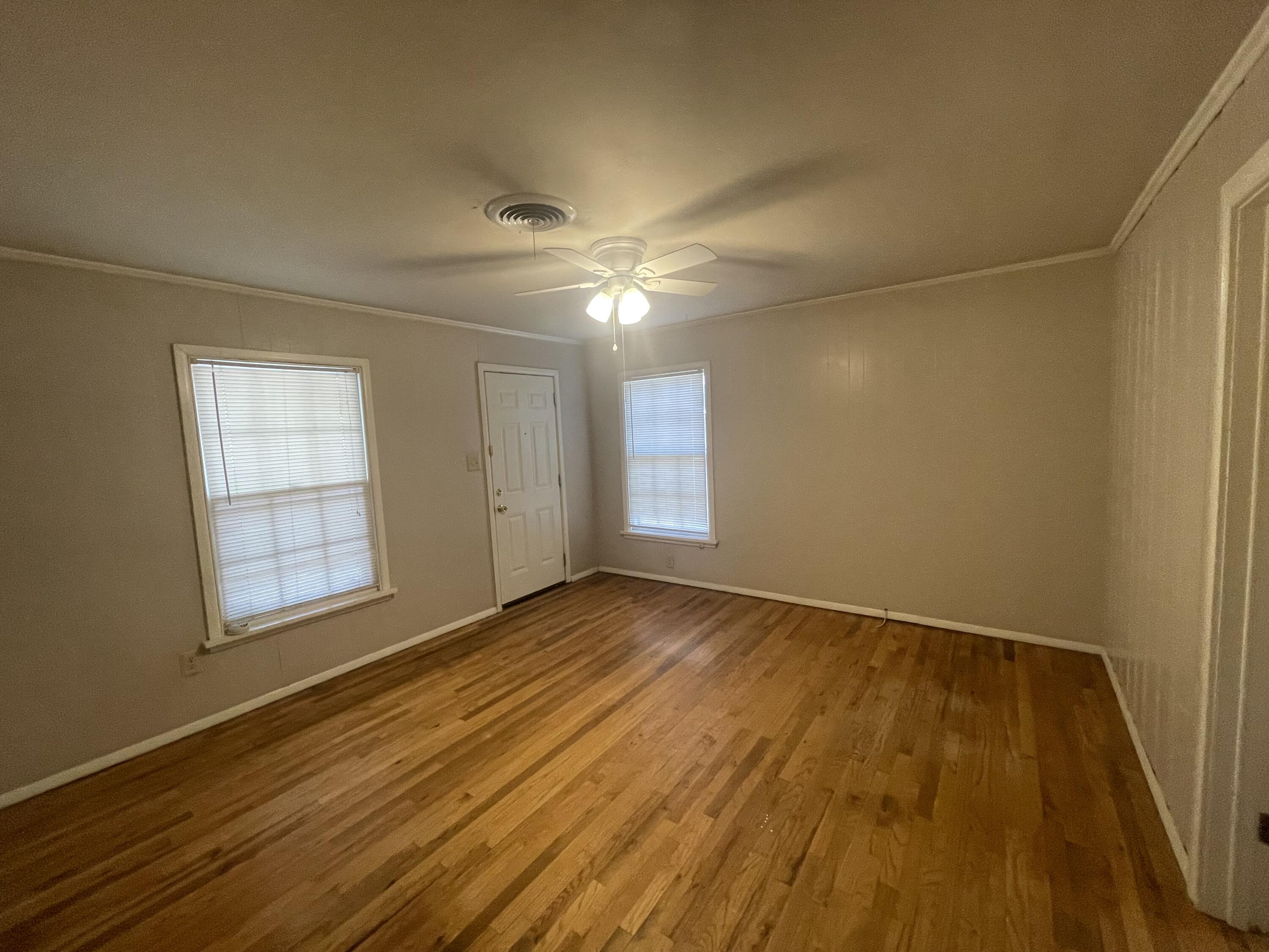 2820 36th Street Lubbock, TX 79413 - Photo 5 of 11 a view of an empty room and window