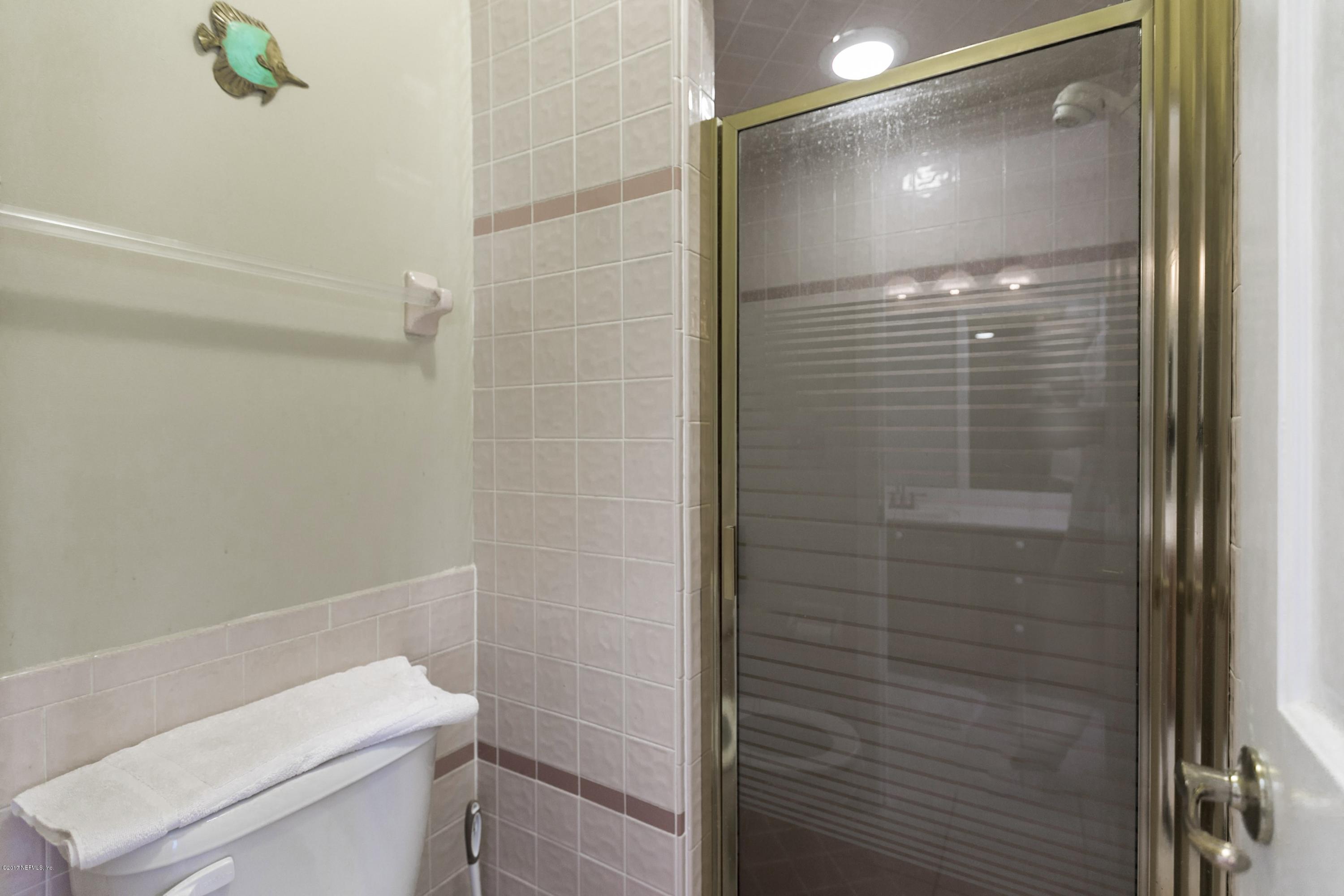 3301 Turtle Creek Road St. Augustine, FL 32086 - Photo 14 of 26 a bathroom with a shower and toilet