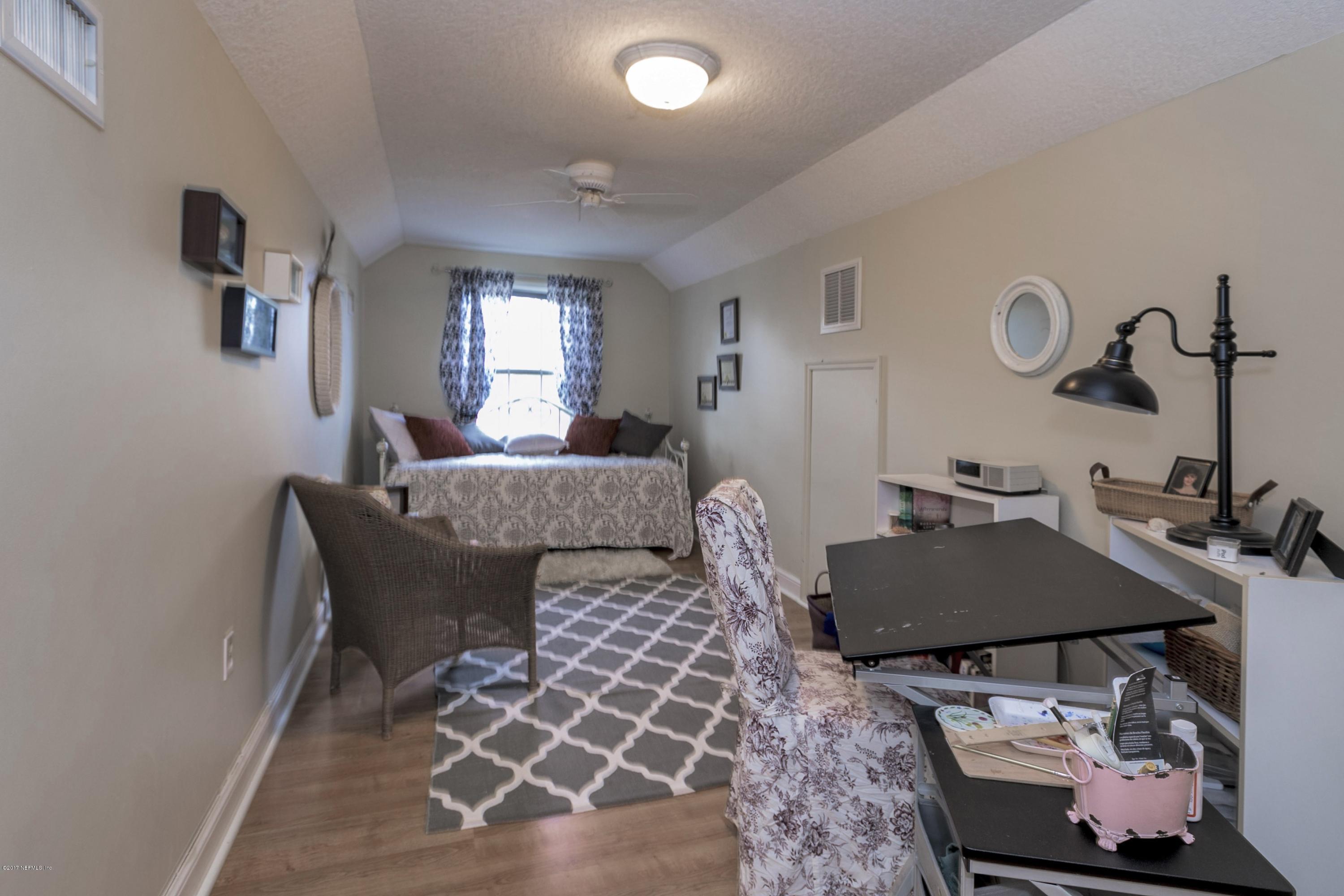 3301 Turtle Creek Road St. Augustine, FL 32086 - Photo 20 of 26 a living room with furniture and wooden floor