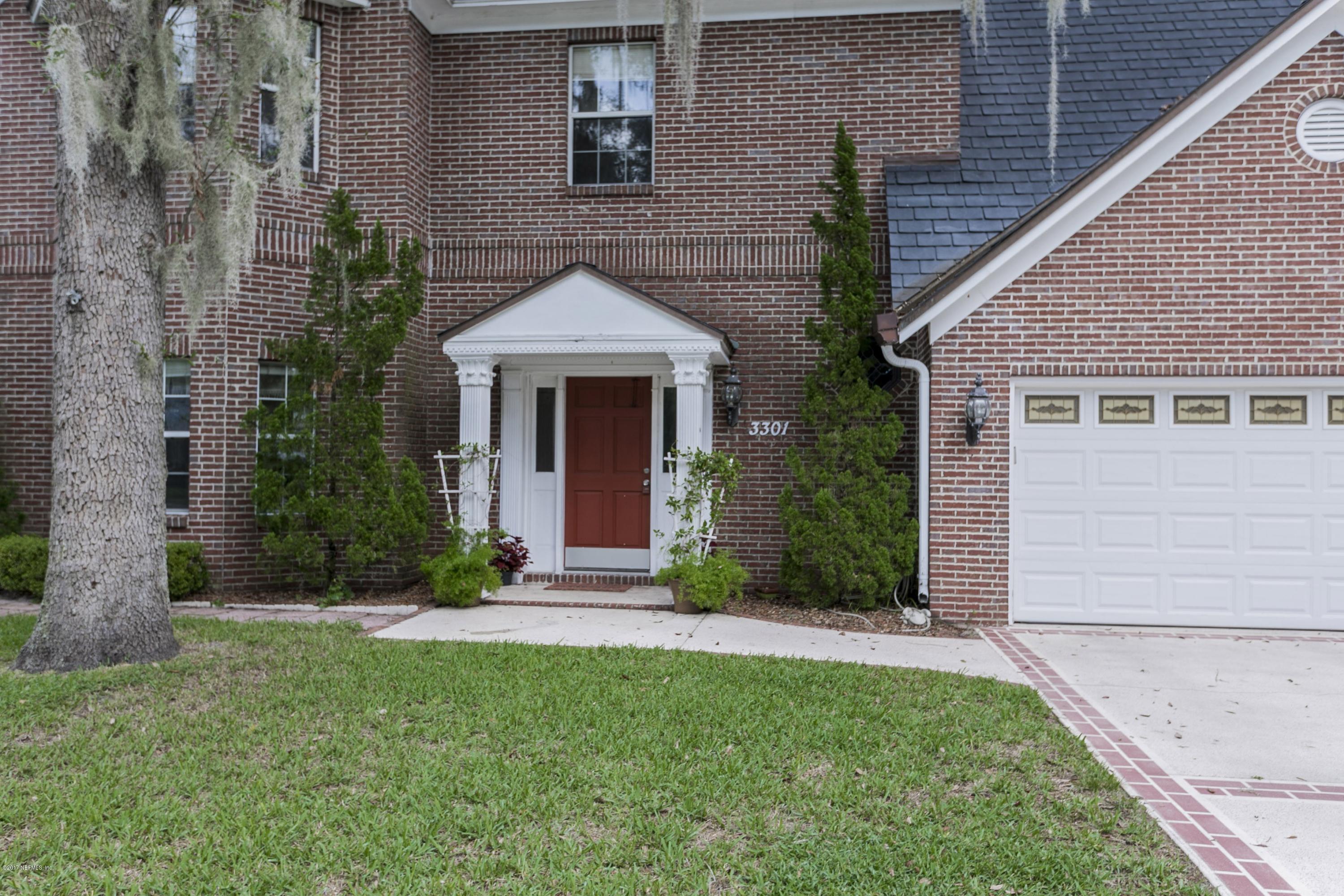 3301 Turtle Creek Road St. Augustine, FL 32086 - Photo 2 of 26 a front view of a house with a yard