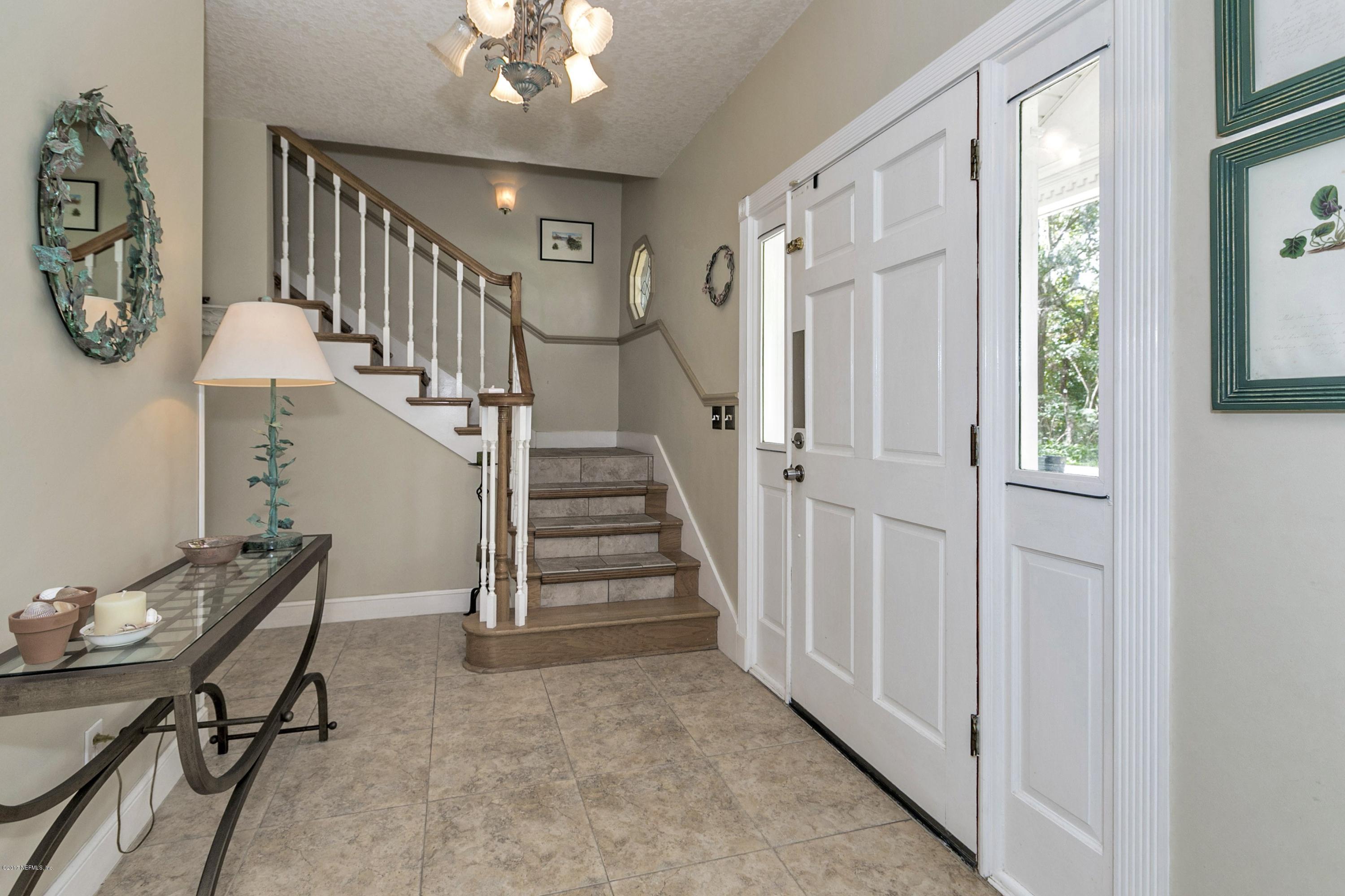 3301 Turtle Creek Road St. Augustine, FL 32086 - Photo 3 of 26 a view of entryway with livingroom and furniture