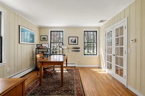 a bed room with a bed and furniture