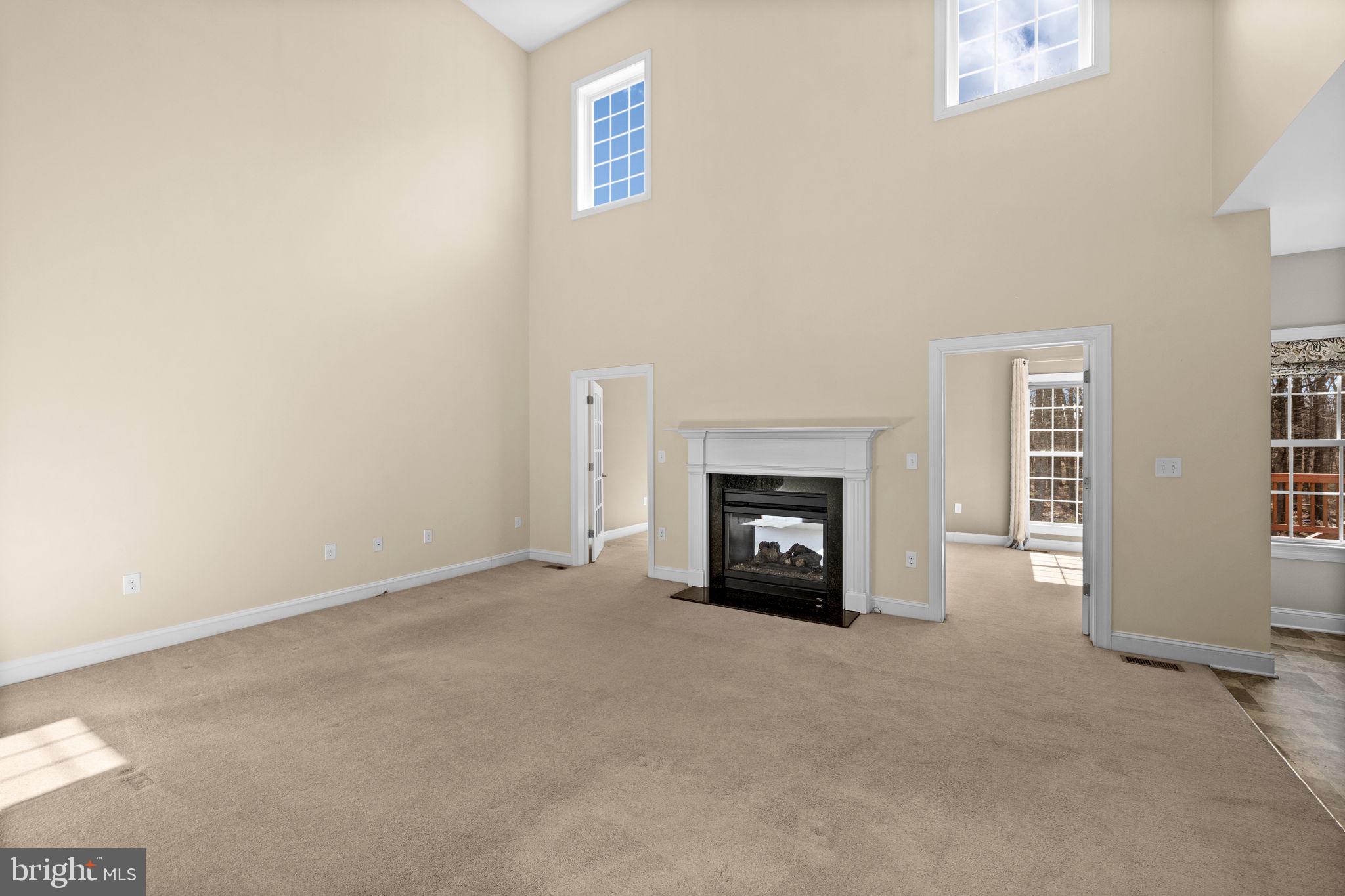 240 Poplar Road Fredericksburg, VA 22406 - Photo 23 of 77 an empty room with furniture and a fireplace
