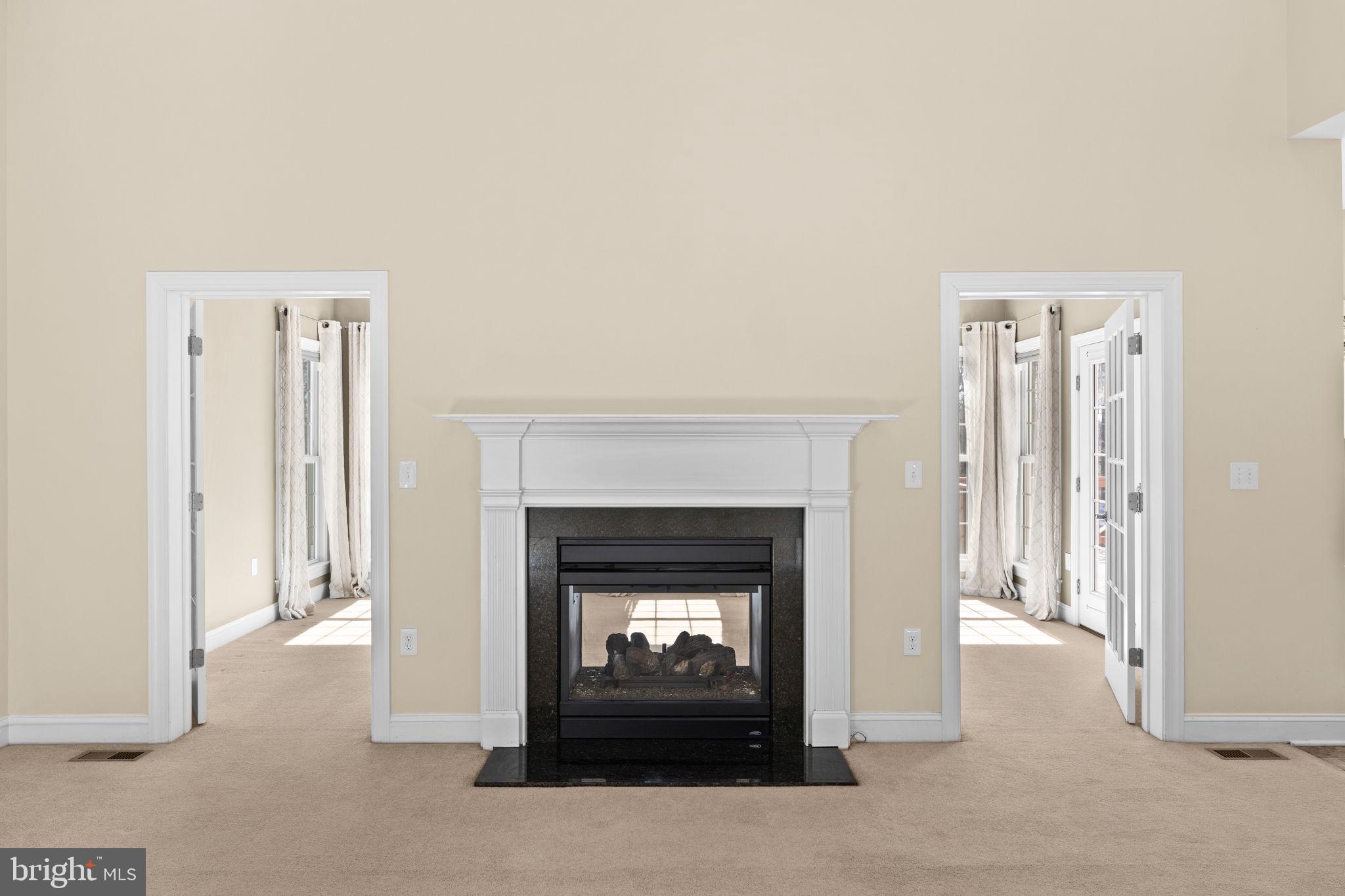 240 Poplar Road Fredericksburg, VA 22406 - Photo 25 of 77 a living room with a fireplace