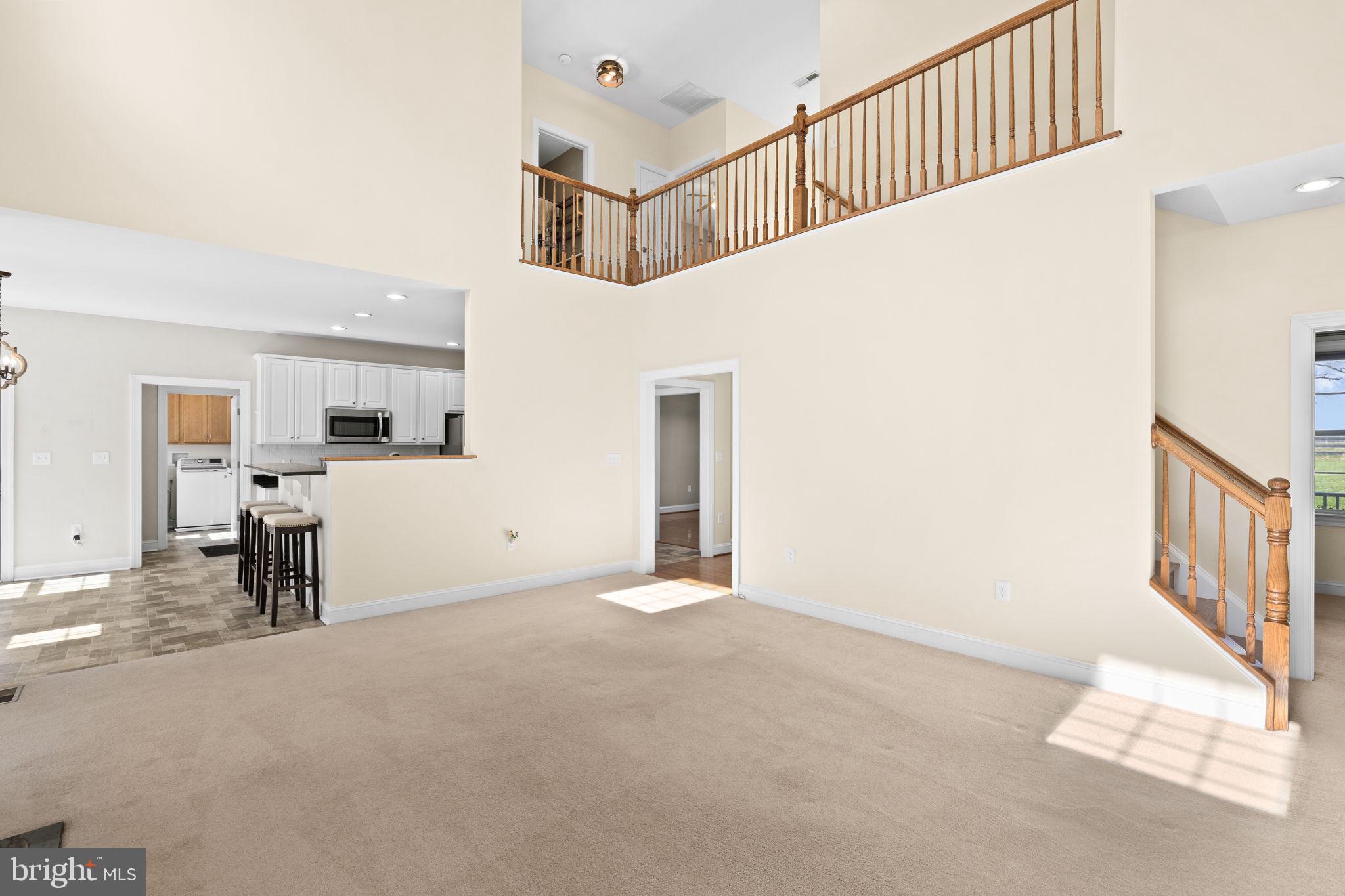 240 Poplar Road Fredericksburg, VA 22406 - Photo 27 of 77 Staircase to upper level tucked out of the way
