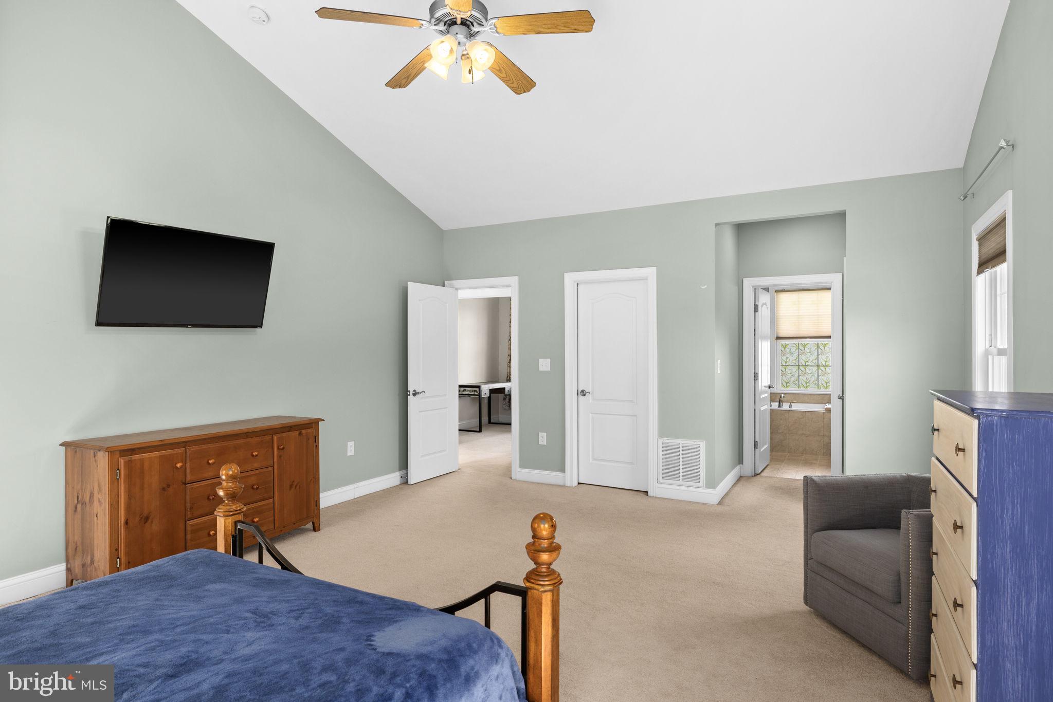 240 Poplar Road Fredericksburg, VA 22406 - Photo 34 of 77 a living room with furniture and a flat screen tv