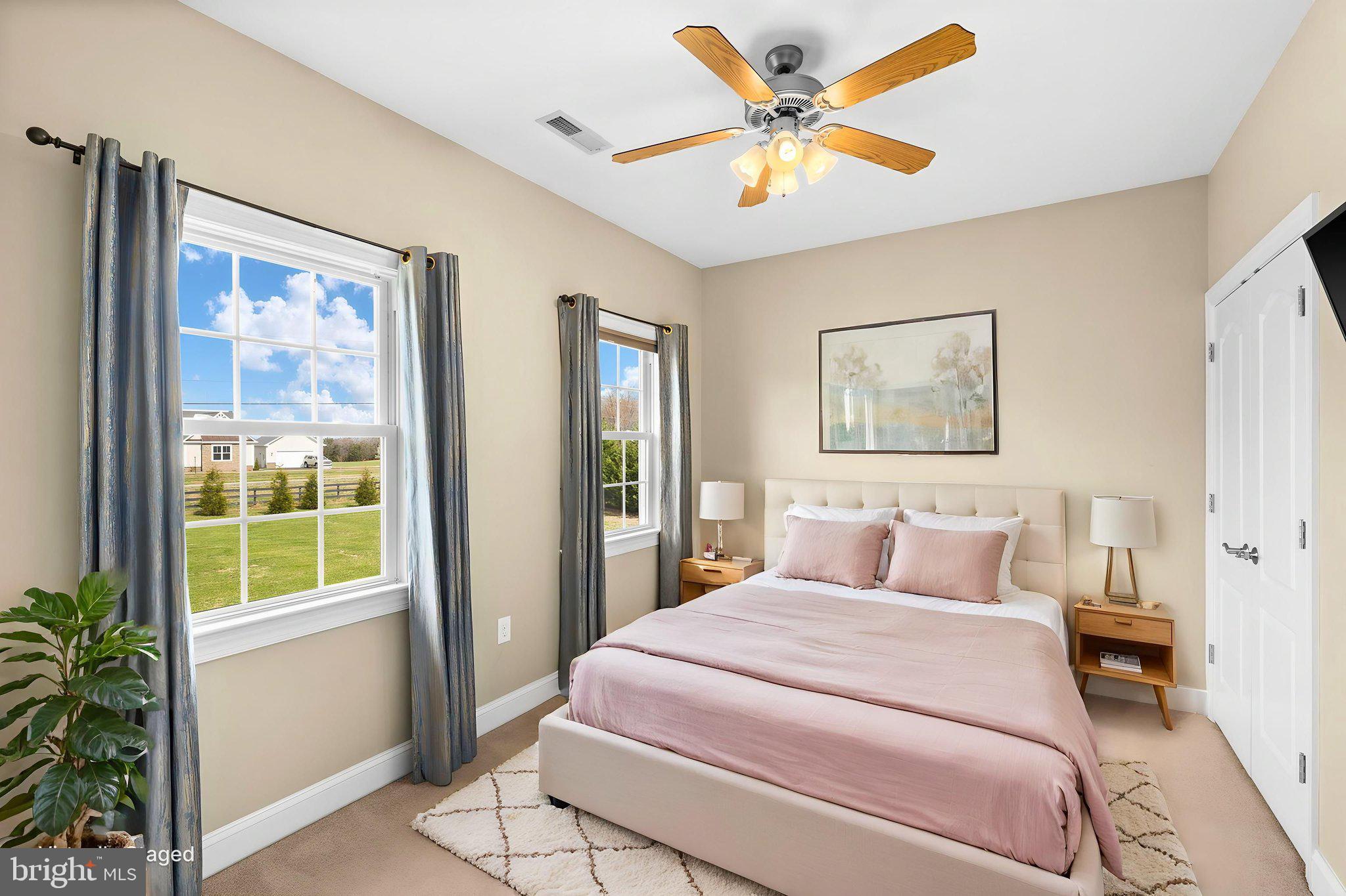 240 Poplar Road Fredericksburg, VA 22406 - Photo 45 of 77 a bedroom with a large bed and a window