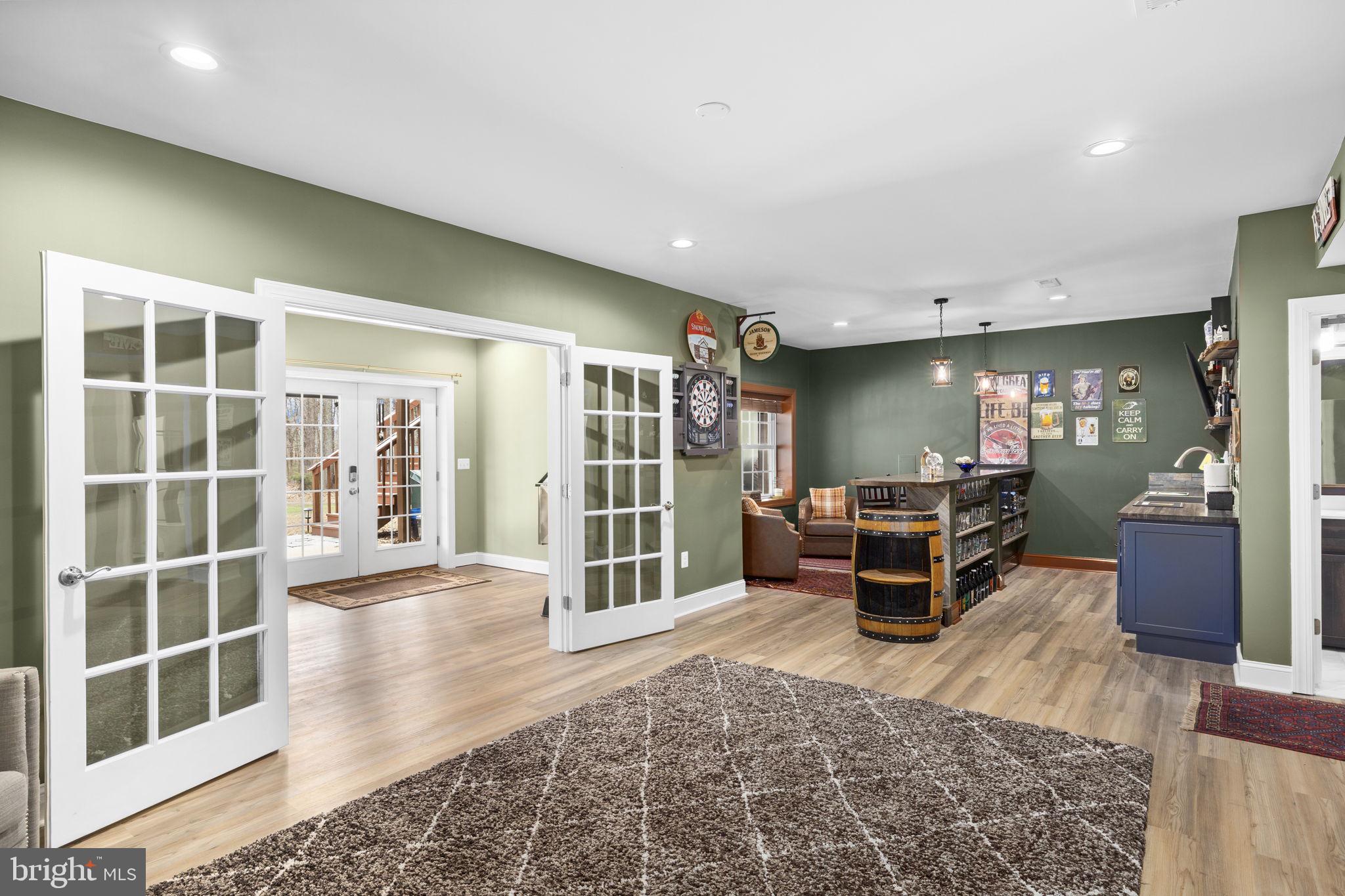 240 Poplar Road Fredericksburg, VA 22406 - Photo 51 of 77 a living room with furniture and a large window