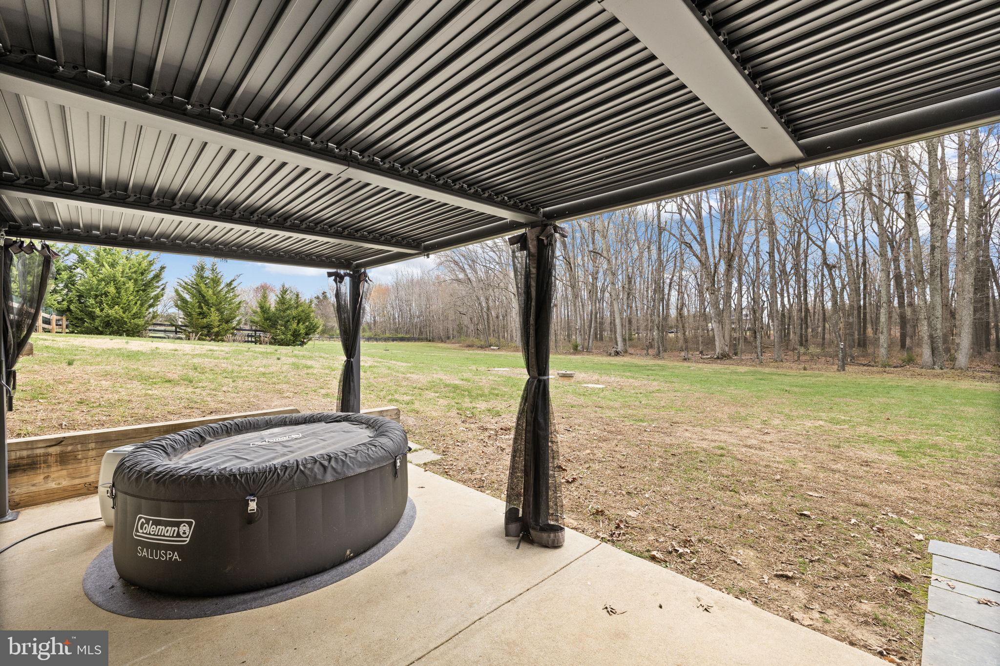 240 Poplar Road Fredericksburg, VA 22406 - Photo 60 of 77 Louvered pergola over patio