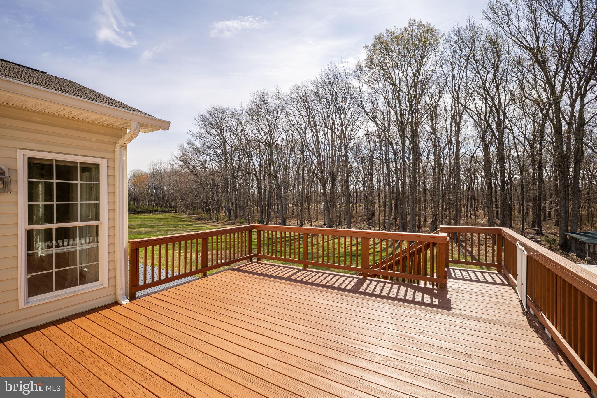 240 Poplar Road Fredericksburg, VA 22406 - Photo 7 of 77 a view of balcony with wooden floor and fence