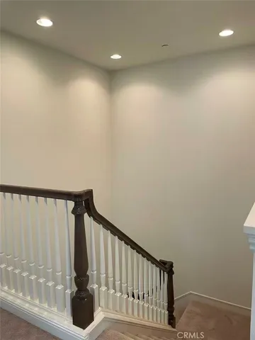 a view of hallway with stairs