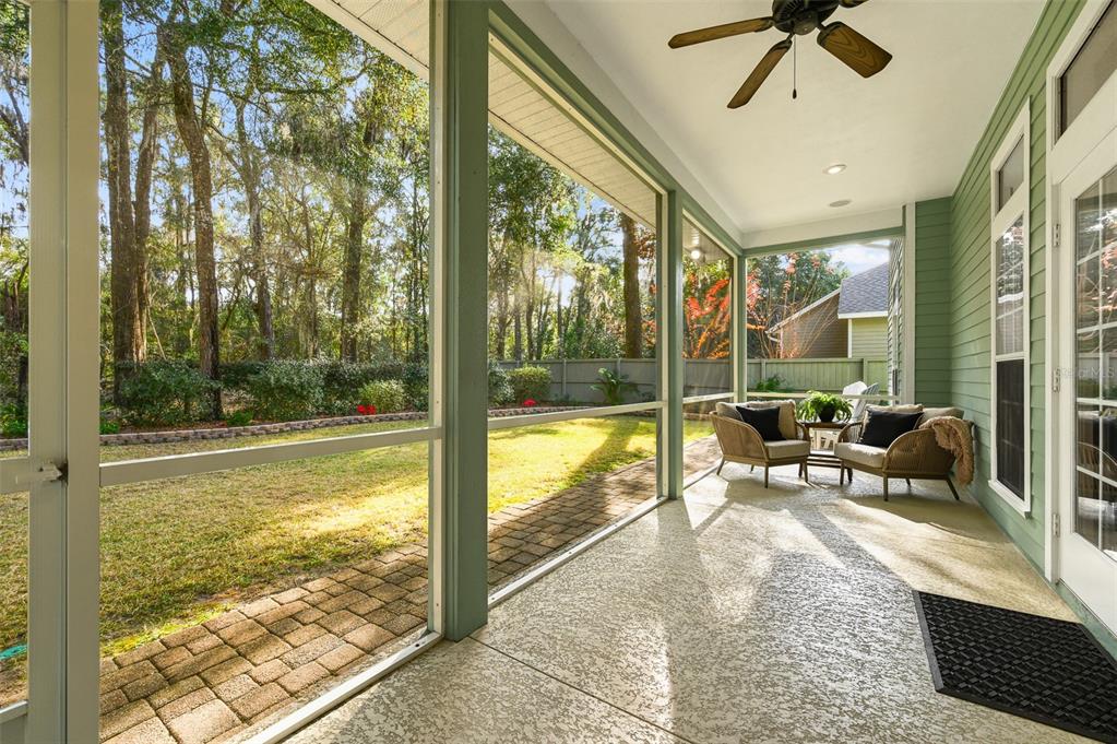 6377 Southwest 88th Terrace Gainesville, FL 32608 - Photo 31 of 37 a living room with hardwood floor and a large window