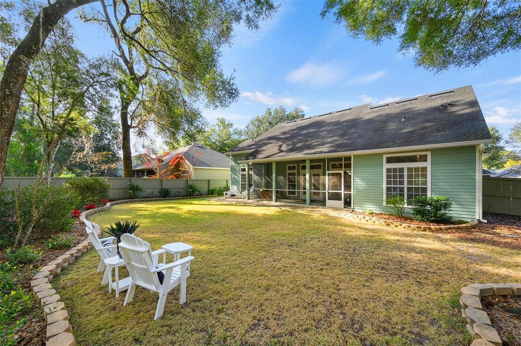 6377 Southwest 88th Terrace Gainesville, FL 32608 - Photo 36 of 37 a view of a house with pool and sitting area