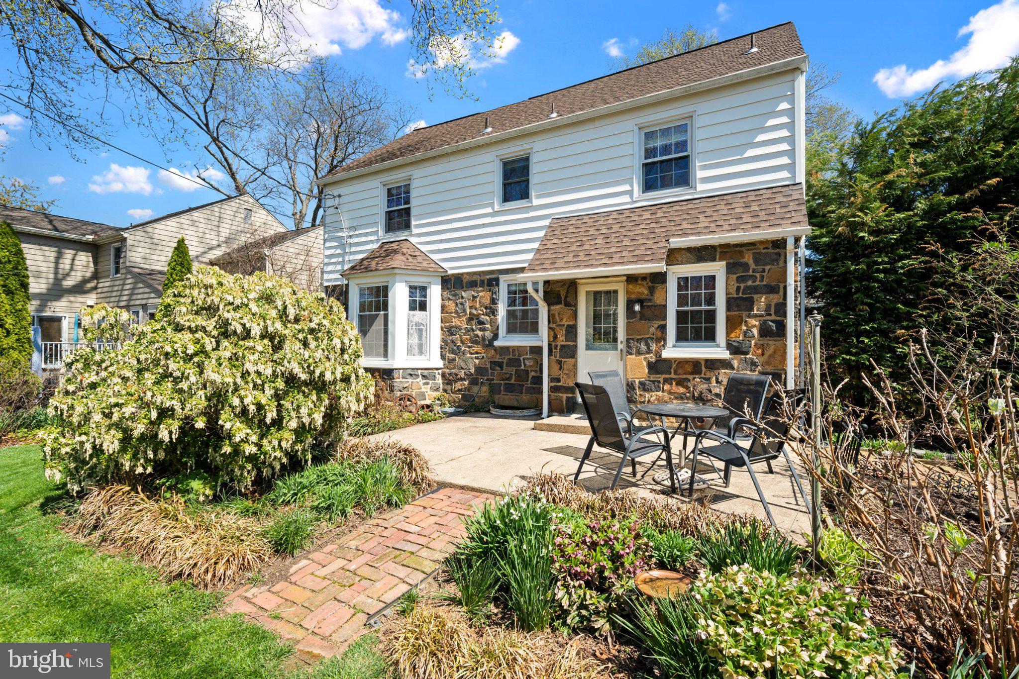 Charming home with lush garden retreat.