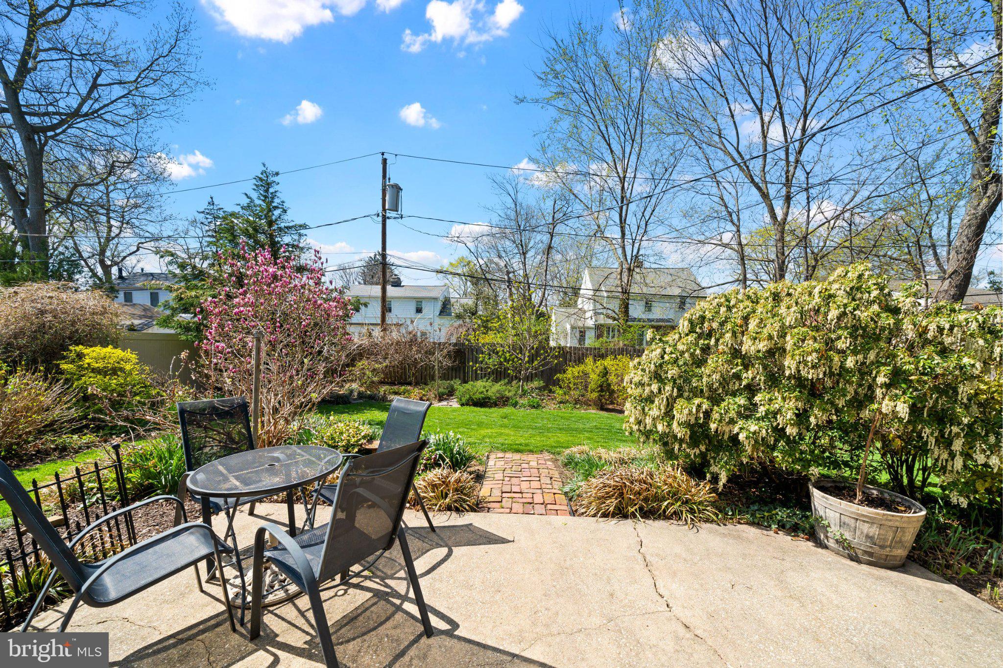 512 Lennox Road Wilmington, DE 19809 - Photo 27 of 28 Sunny patio with lush garden views.
