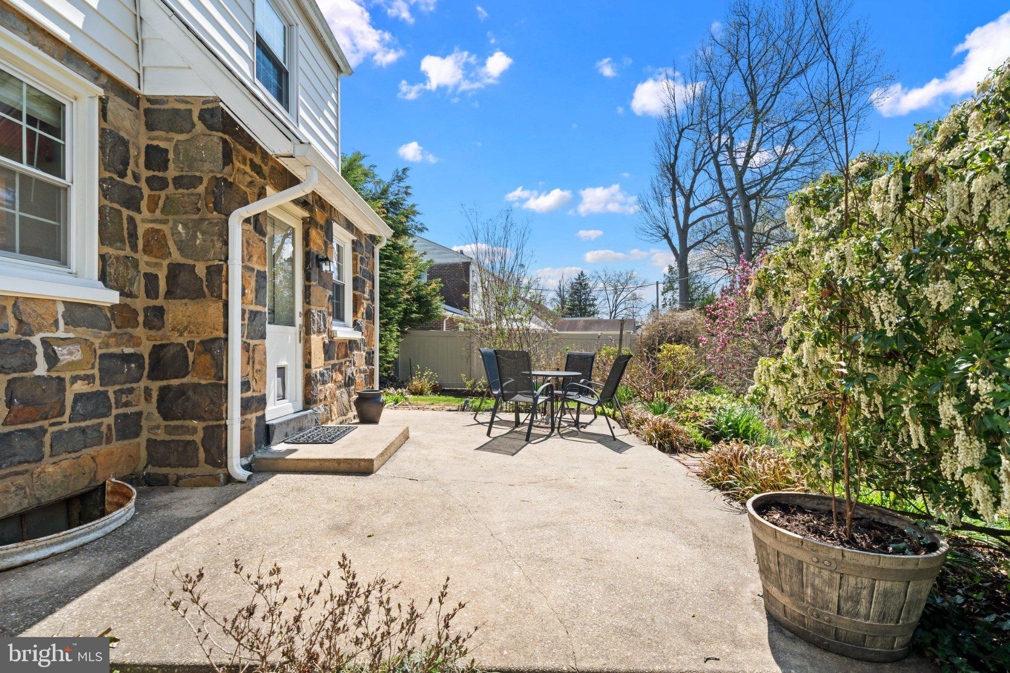 512 Lennox Road Wilmington, DE 19809 - Photo 3 of 28 Charming patio oasis in sunny garden.
