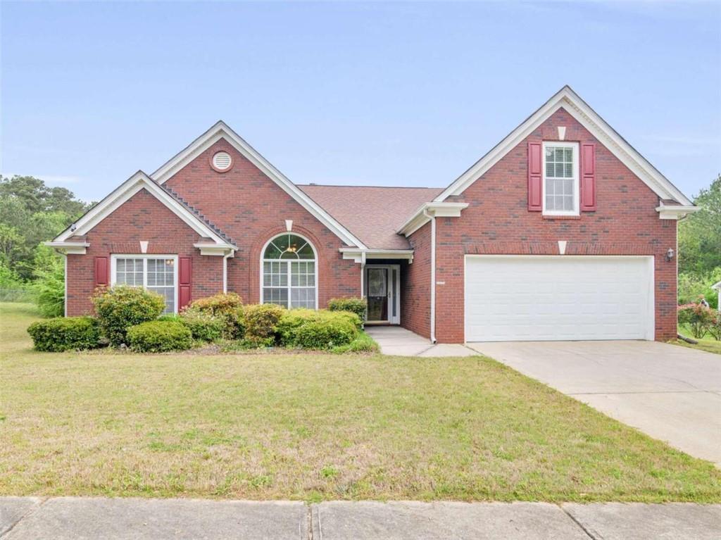 3182 Kings Bay Circle Decatur, GA 30034 - Photo 1 of 1 a front view of a house with a yard and garage