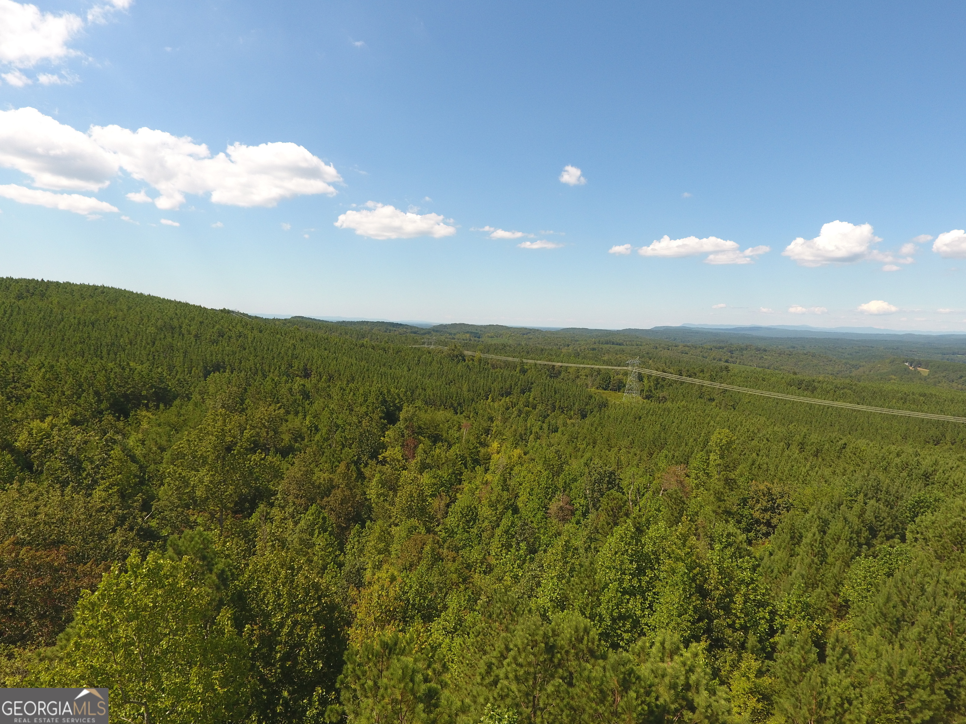 0 Johnson Mountain Road, Unit 7402B Fairmount, GA 30139 - Photo 37 of 37 a view of an ocean and a mountain