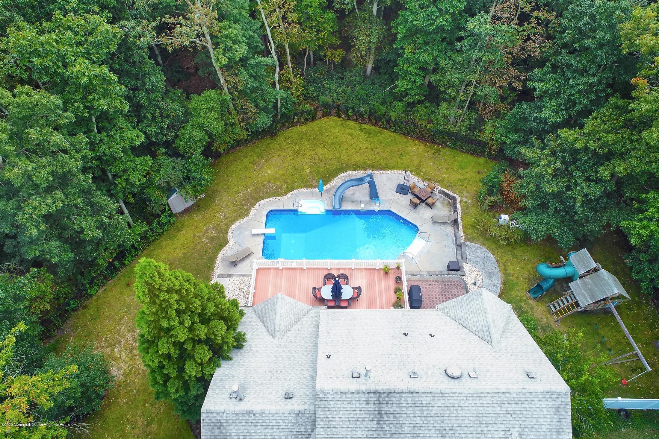 34 Jon Drive Barnegat, NJ 08005 - Photo 12 of 14 an aerial view of a house with outdoor space and swimming pool