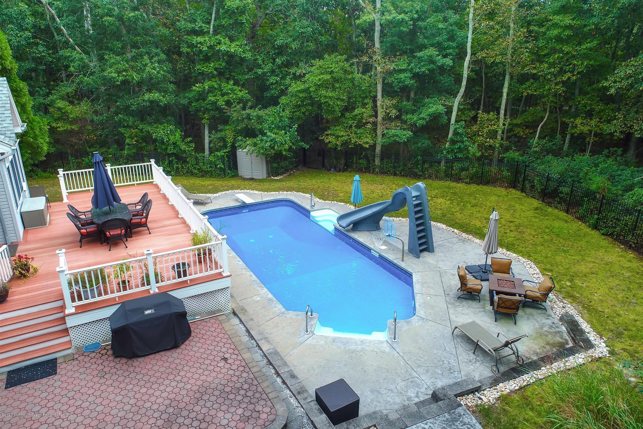 34 Jon Drive Barnegat, NJ 08005 - Photo 3 of 14 swimming pool view with a seating space