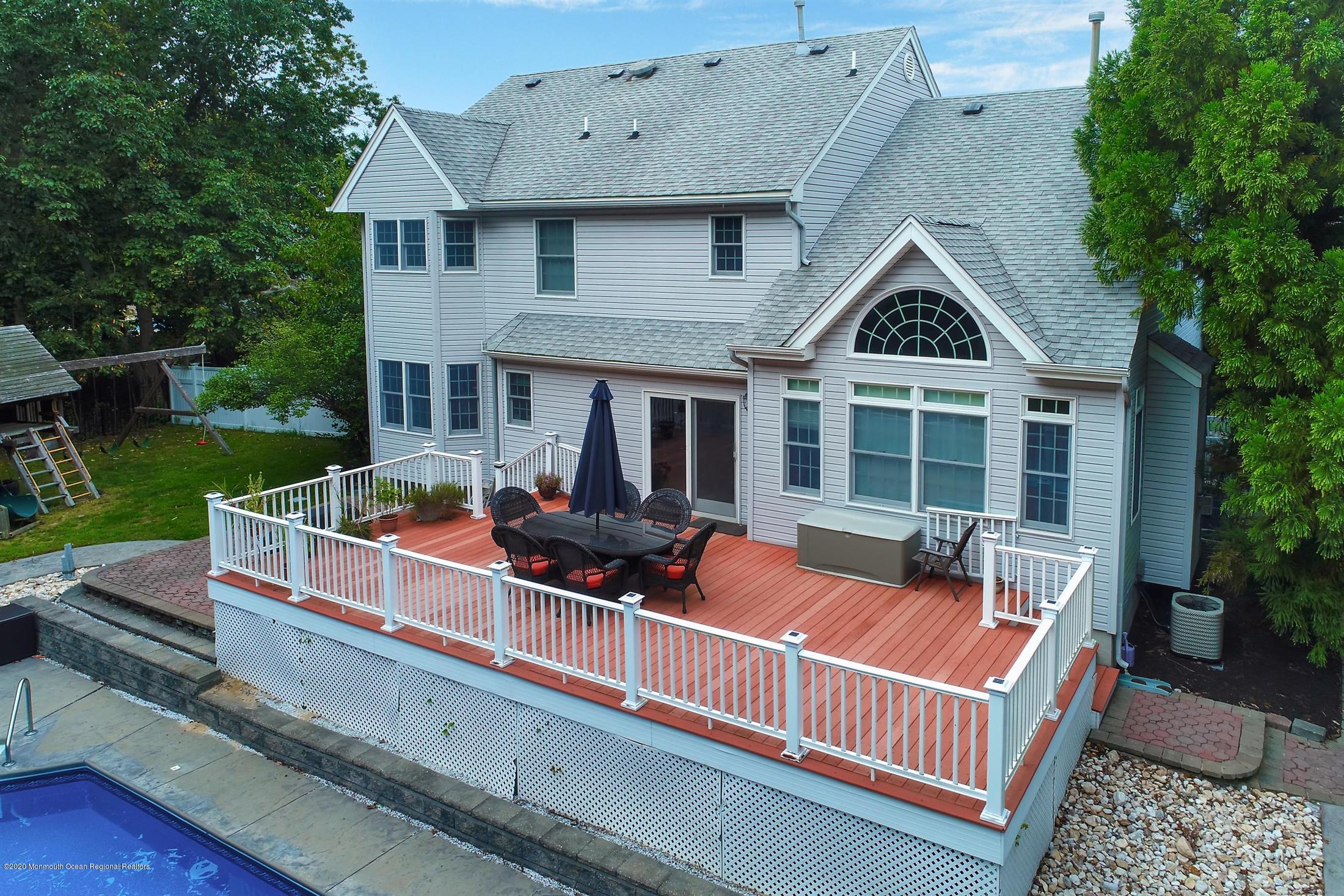 34 Jon Drive Barnegat, NJ 08005 - Photo 5 of 14 a view of a house with a yard and sitting area
