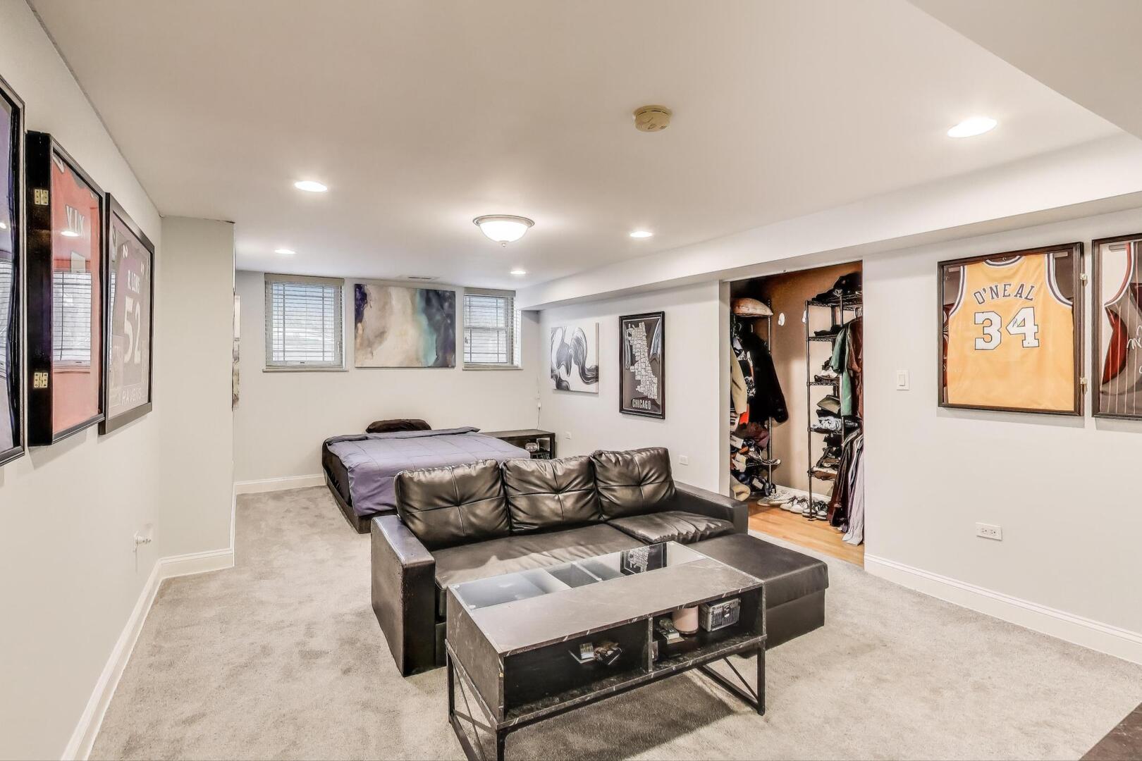 911 Maple Avenue, Unit 1N Evanston, IL 60202 - Photo 23 of 29 a living room with furniture and a wooden floor