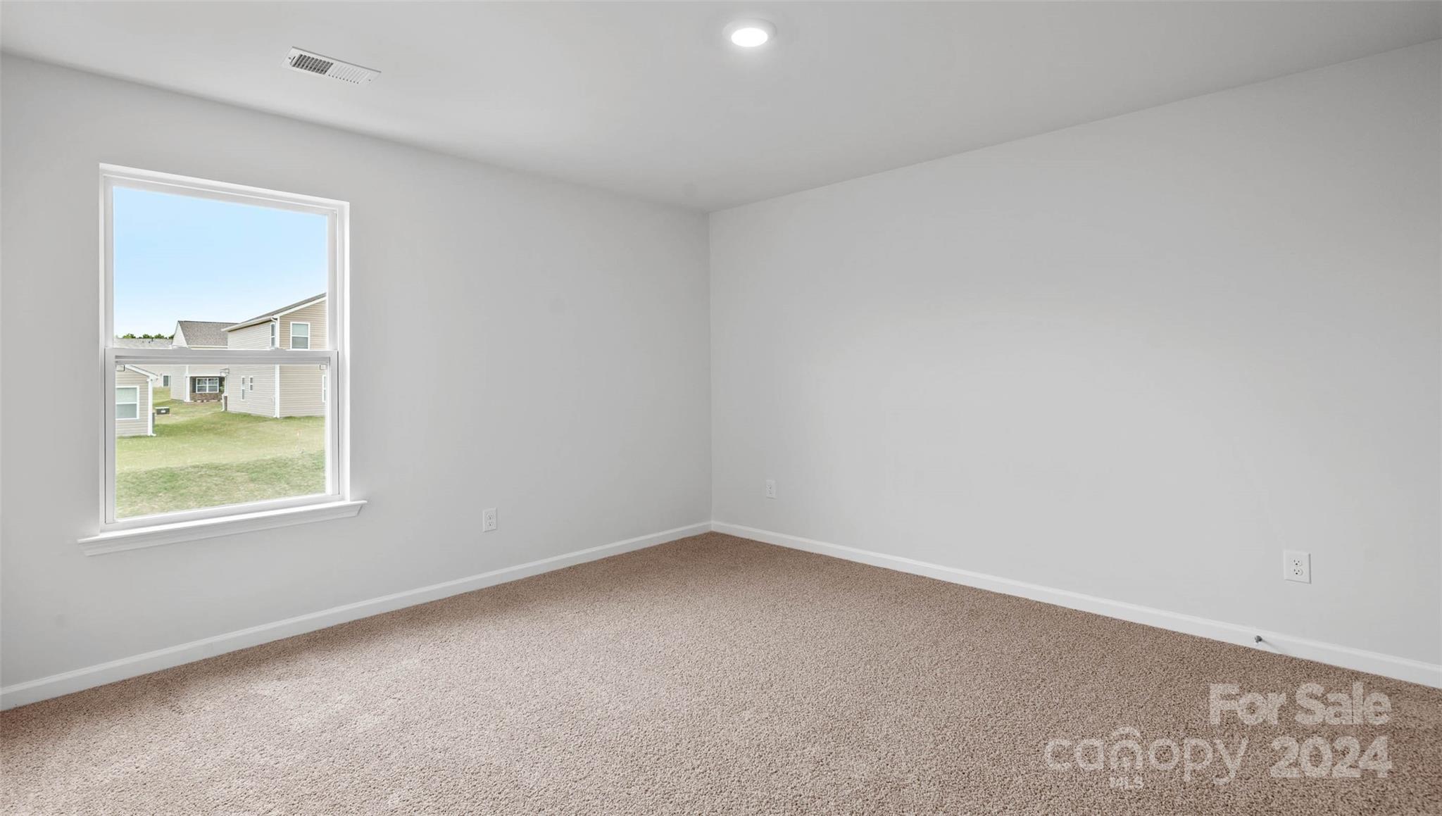83 Callie River Clyde, NC 28721 - Photo 18 of 26 an empty room with a window