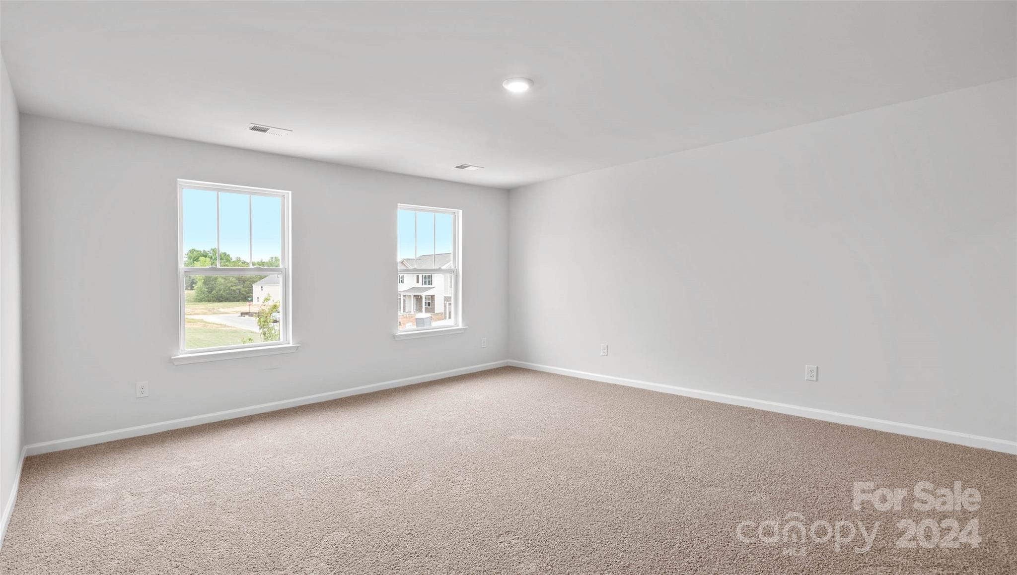 83 Callie River Clyde, NC 28721 - Photo 20 of 26 an empty room with windows