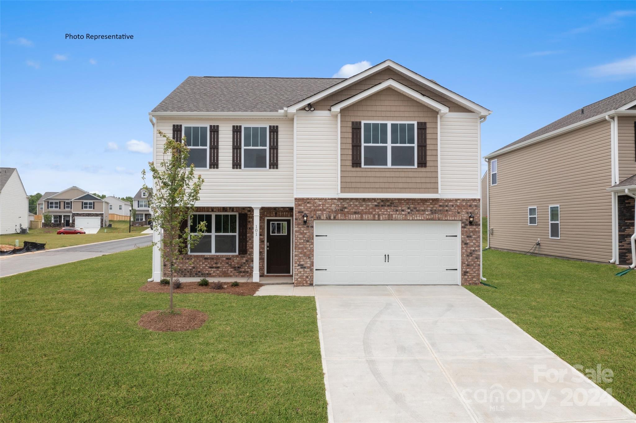 83 Callie River Clyde, NC 28721 - Photo 7 of 26 a front view of a house with a yard