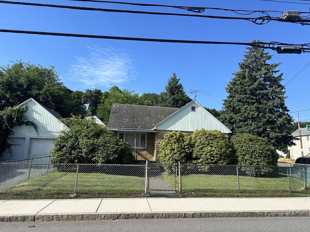 232 Lake Street Waltham, MA 02451 - Photo 2 of 5 a view of a yard in front of a house