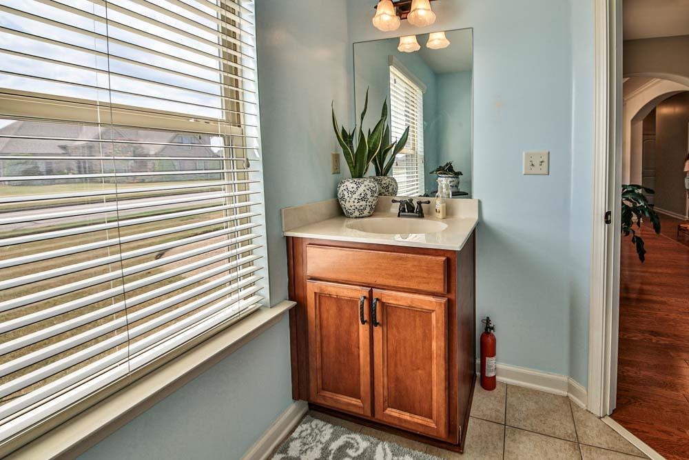 82 Ridgetop Cove Atoka, TN 38004 - Photo 12 of 31 Bathroom featuring vanity and light tile patterned flooring