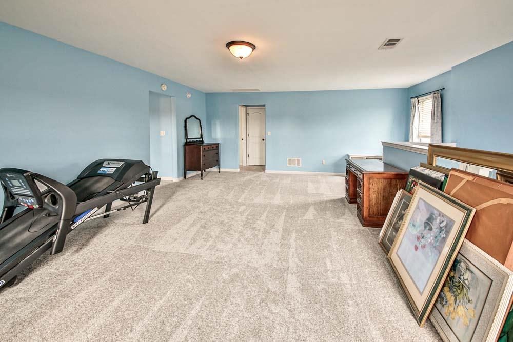 82 Ridgetop Cove Atoka, TN 38004 - Photo 20 of 31 Sitting room featuring light carpet and baseboards