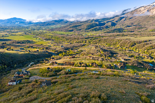 6975 North Durfee Way, Unit 20 Eden, UT 84310 - Photo 5 of 15 Expansive mountain landscape featuring varied terrain and scattered residential properties