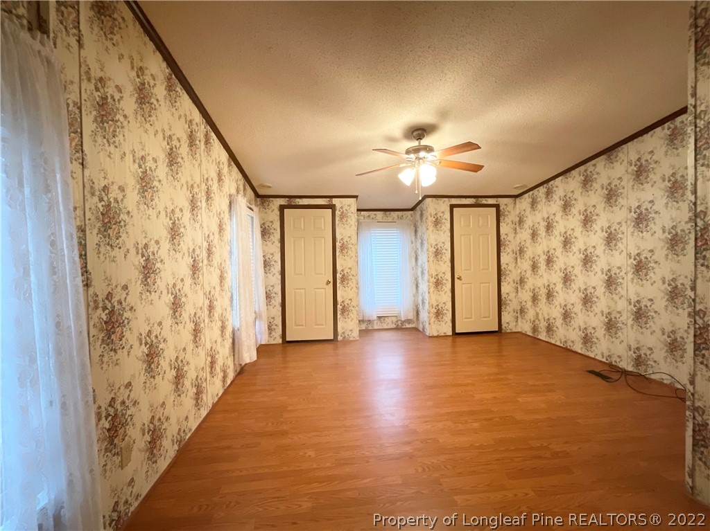 269 Read Road Cameron, NC 28326 - Photo 11 of 21 wooden floor in an empty room with a window
