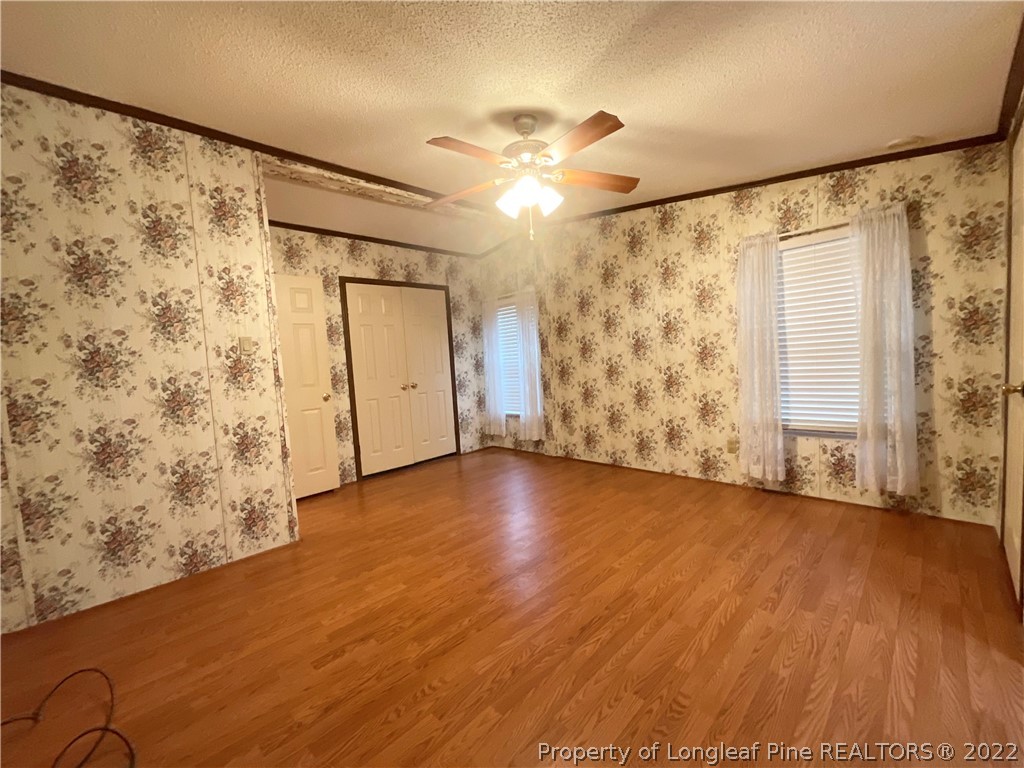 269 Read Road Cameron, NC 28326 - Photo 12 of 21 wooden floor in an empty room