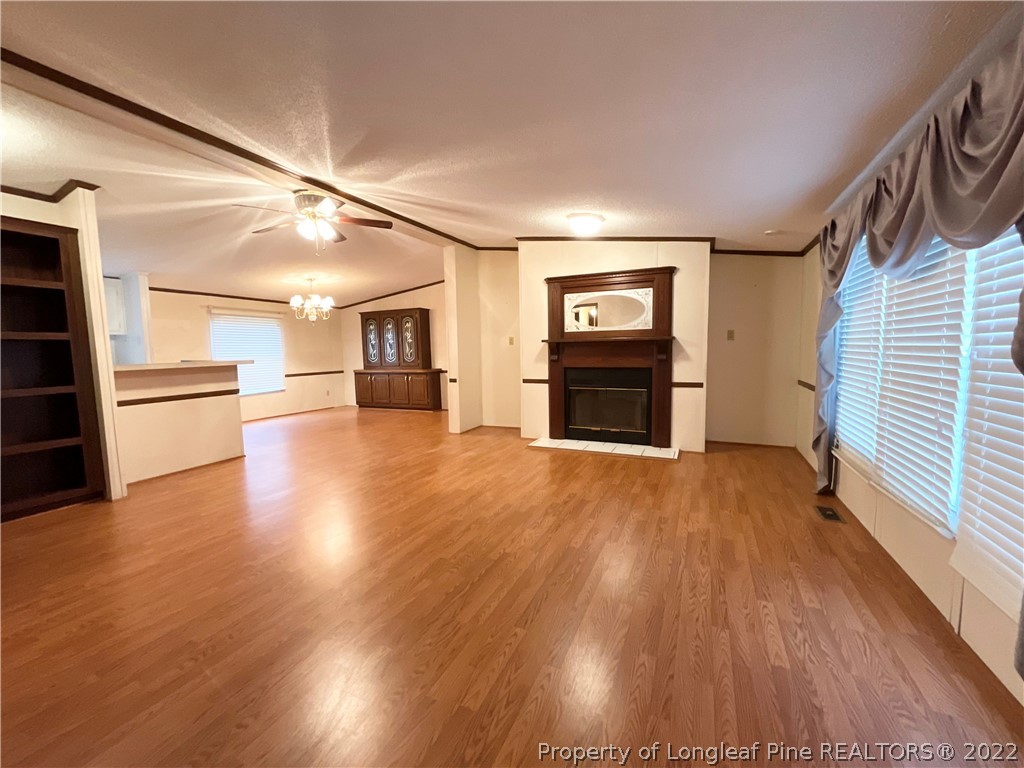 269 Read Road Cameron, NC 28326 - Photo 2 of 21 a view of a hallway with wooden floor and windows
