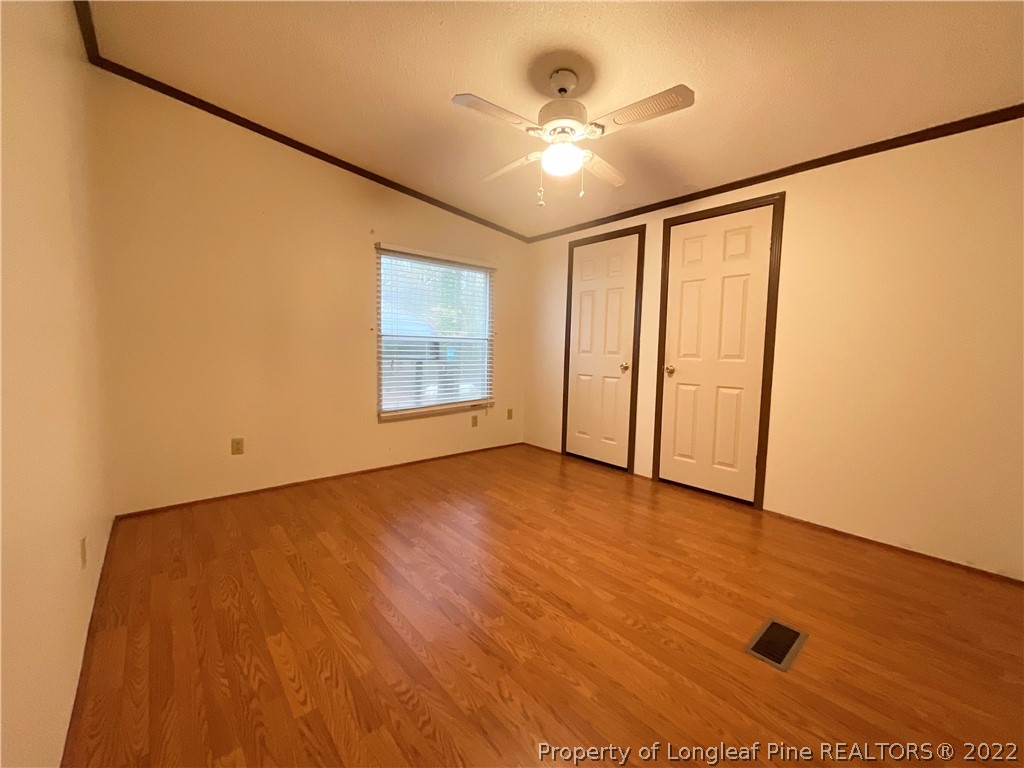 269 Read Road Cameron, NC 28326 - Photo 10 of 21 wooden floor in an empty room with a window
