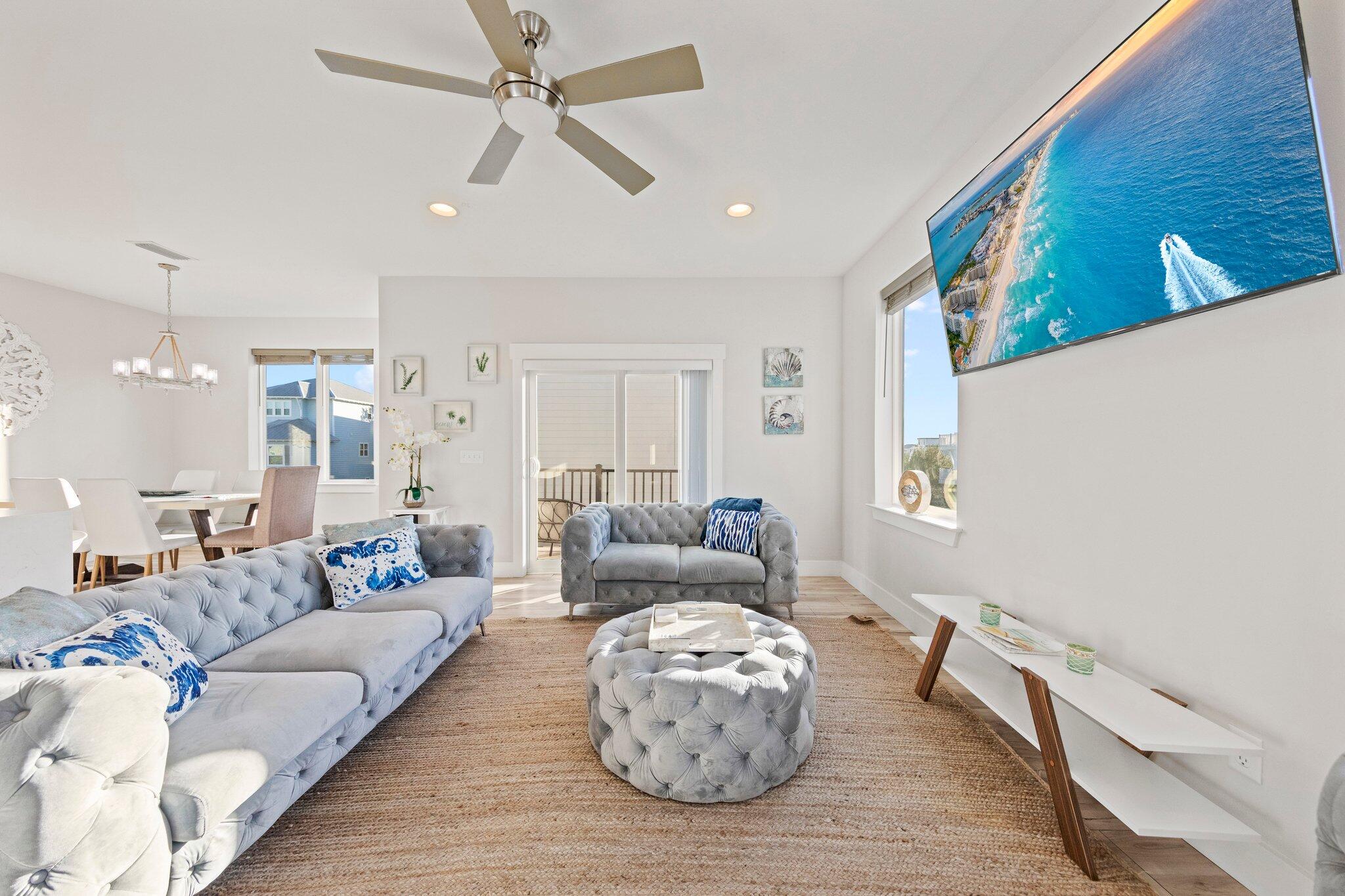 29 Seaview Dr Inlet Beach Inlet Beach, FL 32461 - Photo 23 of 52 a living room with furniture and a chandelier