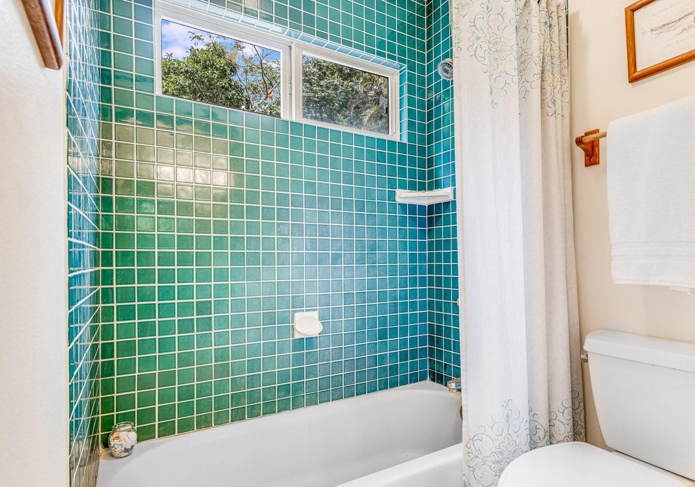 592 Kaupakalua Road Haiku, HI 96708 - Photo 17 of 28 a bathroom with a toilet and a shower