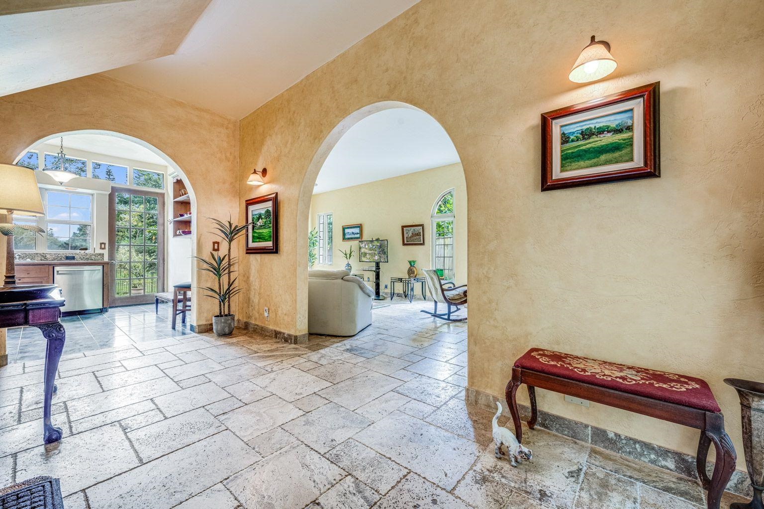 592 Kaupakalua Road Haiku, HI 96708 - Photo 4 of 28 a very nice looking room with a large window and a fireplace