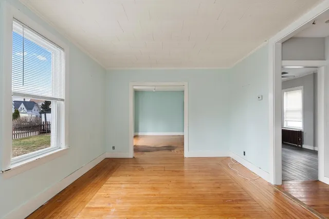 a view of an empty room and window