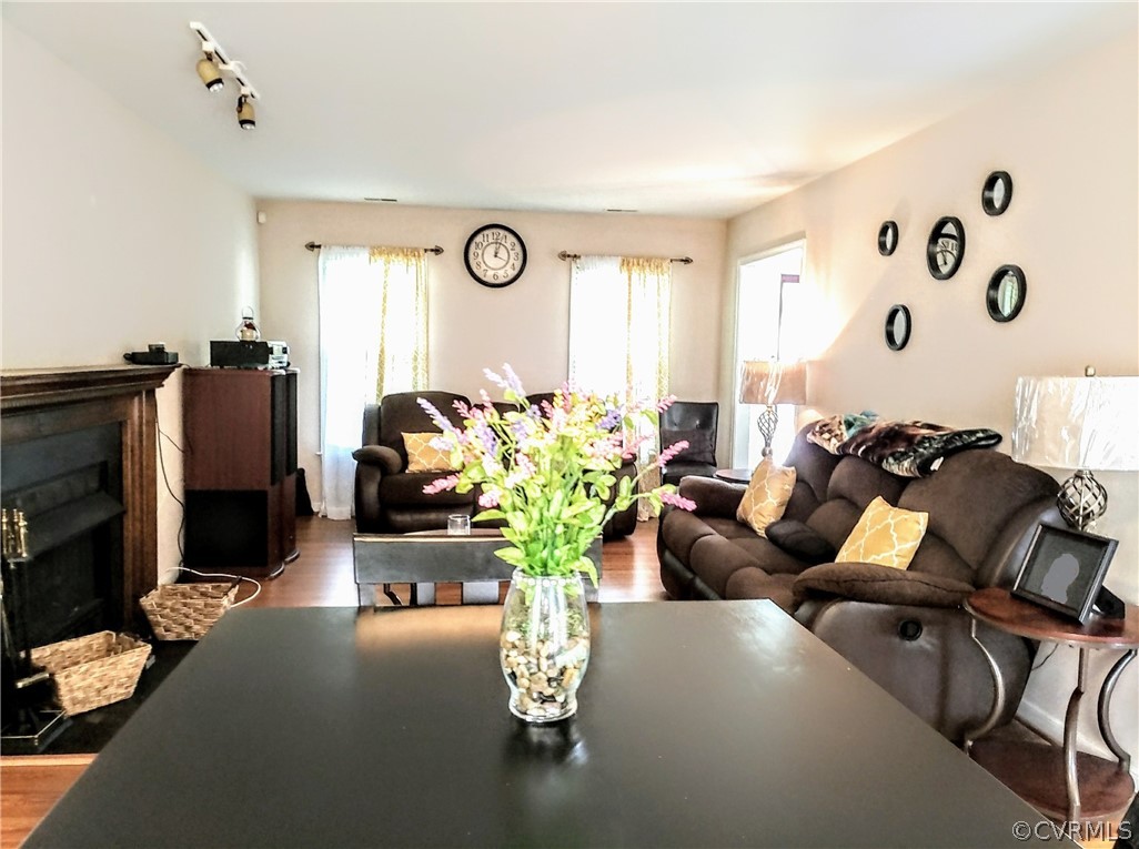 6707 Huntsville Road Chesterfield, VA 23832 - Photo 3 of 17 a living room with furniture flowerpot and a fireplace