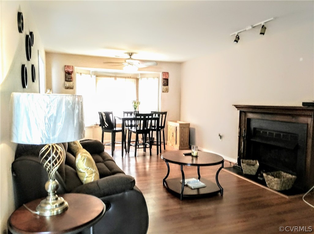 6707 Huntsville Road Chesterfield, VA 23832 - Photo 5 of 17 a living room with furniture and a fireplace