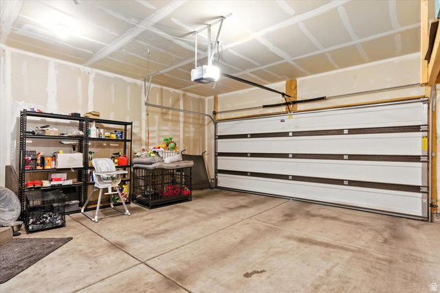 1187 Seraphim Court Layton, UT 84041 - Photo 15 of 18 Garage with a garage door opener
